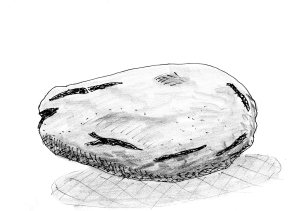 A cold baked potato for dinner for Paddy